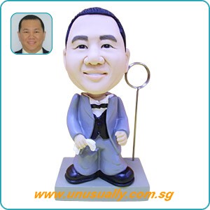 Custom Caricature 3D Grey Suit Figurine On Grey Memo Stand